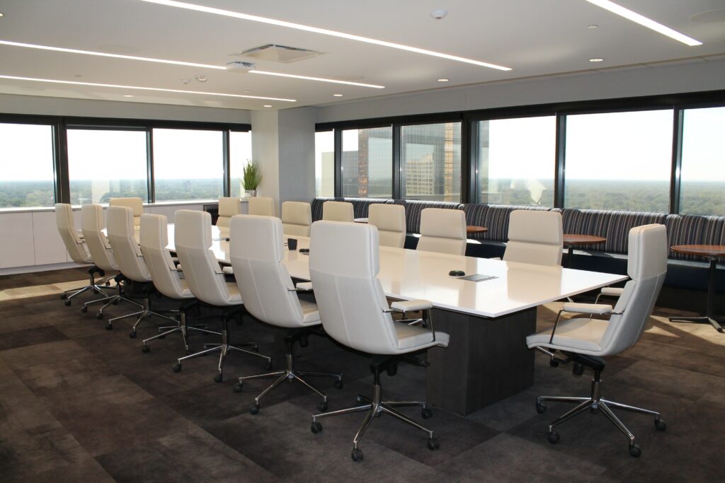 https://wealthpoint.net/wp-content/uploads/2023/03/LinkedIn-Image-1024x683.jpg conference room in a large building